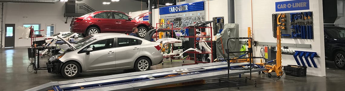 Vehicles being repaired at the body shop at Goldstein Collision Center in Albany NY